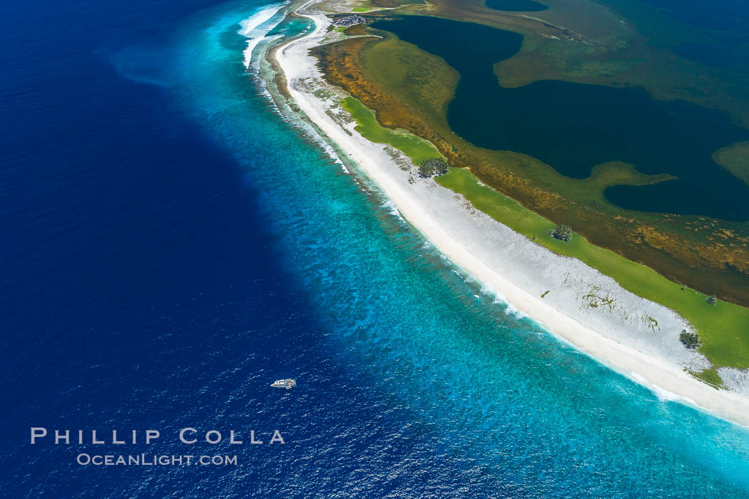 Aerial photo of M/V Nautilus Undersea at Clipperton Island.  Clipperton Island, a minor territory of France also known as Ile de la Passion, is a small (2.3 sq mi) but  spectacular coral atoll in the eastern Pacific. By permit HC / 1485 / CAB (France)., natural history stock photograph, photo id 32930