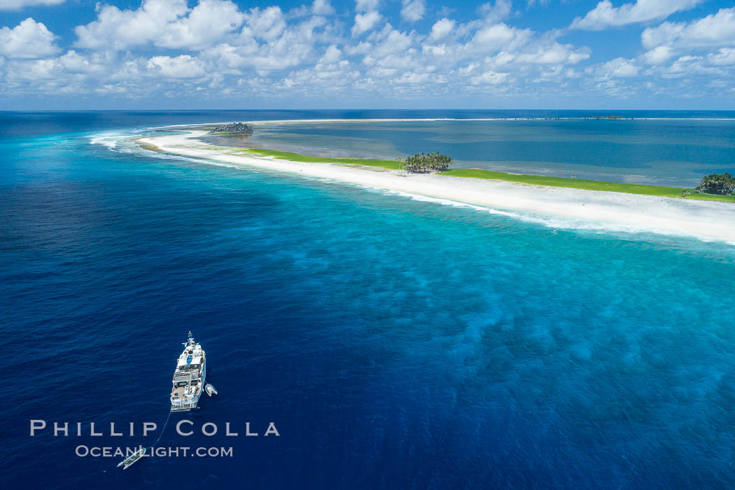 Aerial photo of M/V Nautilus Undersea at Clipperton Island.  Clipperton Island, a minor territory of France also known as Ile de la Passion, is a small (2.3 sq mi) but  spectacular coral atoll in the eastern Pacific. By permit HC / 1485 / CAB (France)., natural history stock photograph, photo id 32875