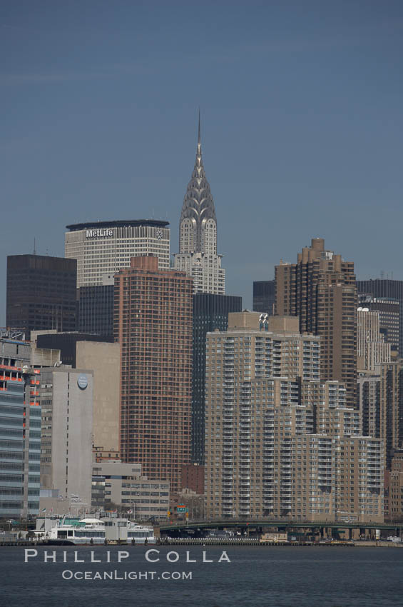 The Chrysler Building rises above the New York skyline as viewed from the East River. Manhattan, New York City, USA, natural history stock photograph, photo id 11126