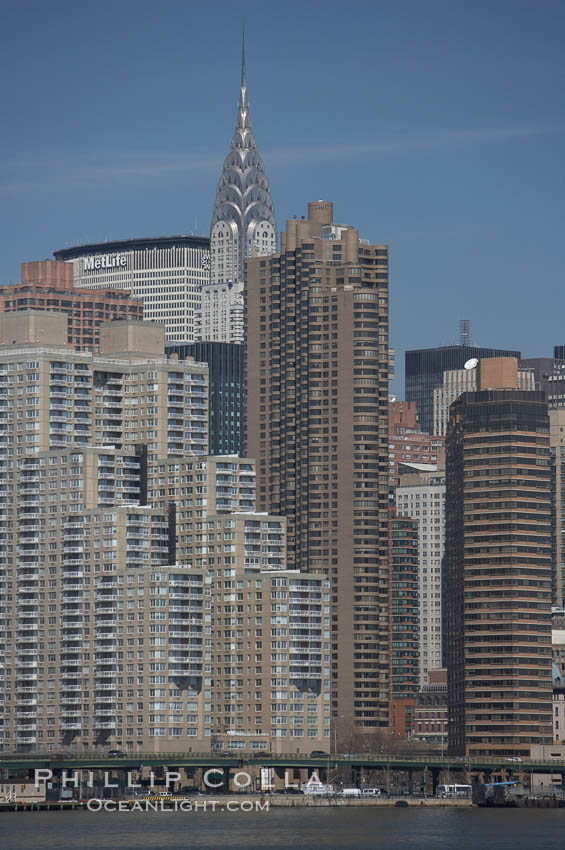 The Chrysler Building rises above the New York skyline as viewed from the East River. Manhattan, New York City, USA, natural history stock photograph, photo id 11127