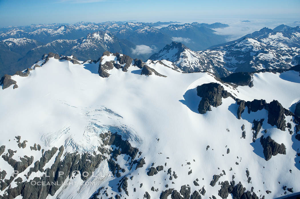 Glaciers on the summit of Mariner Mountain, on the west coast of Vancouver Island, British Columbia, Canada, part of Strathcona Provincial Park, located 36 km (22 mi) north of Tofino.  It is 1,771 m (5,810 ft) high and is snow covered year-round., natural history stock photograph, photo id 21090