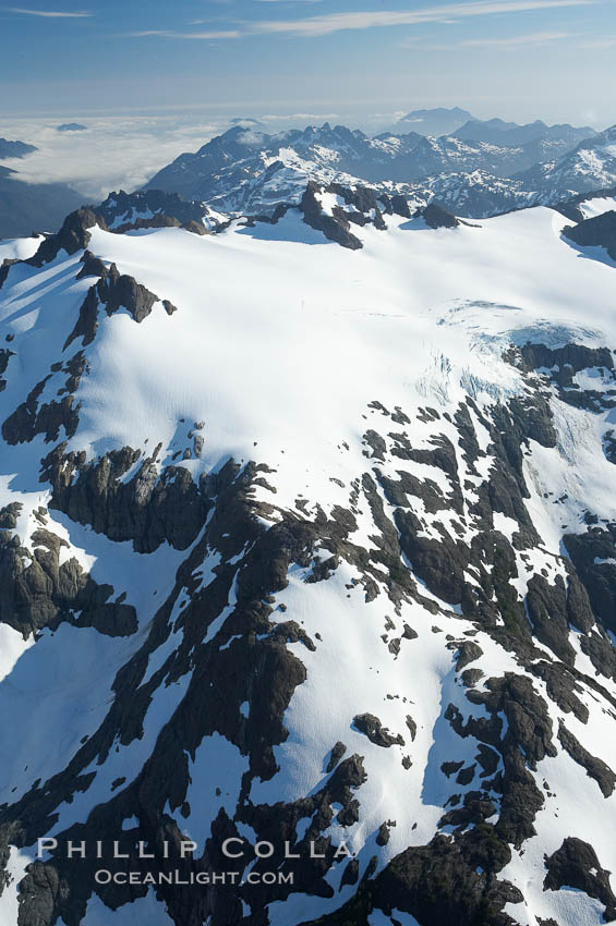 Glaciers on the summit of Mariner Mountain, on the west coast of Vancouver Island, British Columbia, Canada, part of Strathcona Provincial Park, located 36 km (22 mi) north of Tofino.  It is 1,771 m (5,810 ft) high and is snow covered year-round., natural history stock photograph, photo id 21091