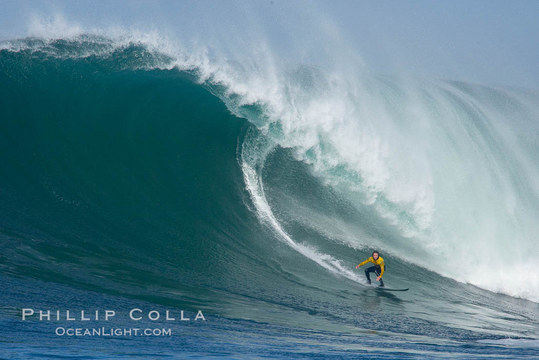 Grant Baker, champion, catches one of his many great waves of the day, this one in the first round.  Mavericks surf contest, February 7, 2006. Half Moon Bay, California, USA, natural history stock photograph, photo id 15312