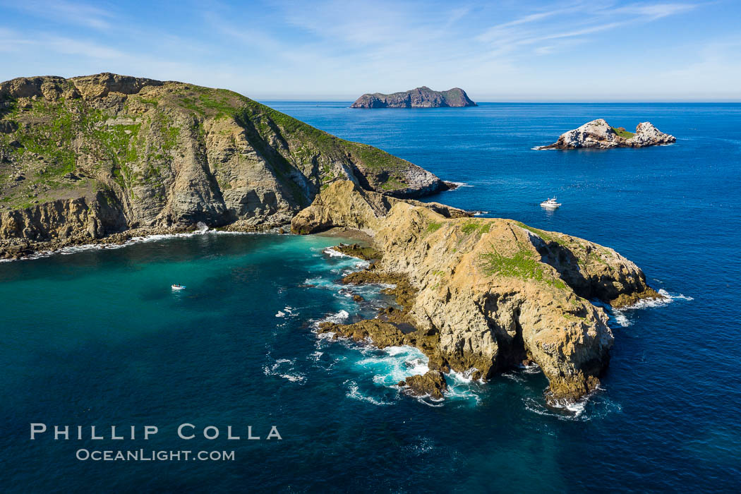 Middle Coronado Island, aerial photo. Moonlight Cove on the left. Middle Rocks (Middle Grounds) and North Coronado Island in the distance. Coronado Islands (Islas Coronado), Baja California, Mexico, natural history stock photograph, photo id 35087