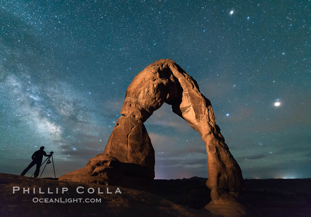 Milky Way and Stars over Delicate Arch, at night, Arches National Park, Utah (Note: this image was created before a ban on light-painting in Arches National Park was put into effect.  Light-painting is no longer permitted in Arches National Park). USA, natural history stock photograph, photo id 29292