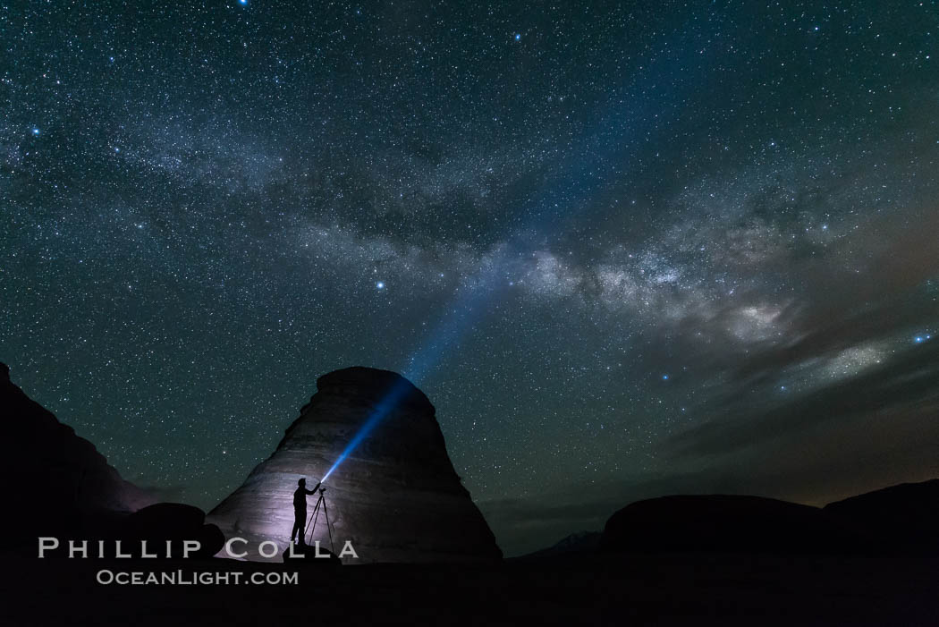 Milky Way and Stars over Delicate Arch, at night, Arches National Park, Utah (Note: this image was created before a ban on light-painting in Arches National Park was put into effect.  Light-painting is no longer permitted in Arches National Park). USA, natural history stock photograph, photo id 29293