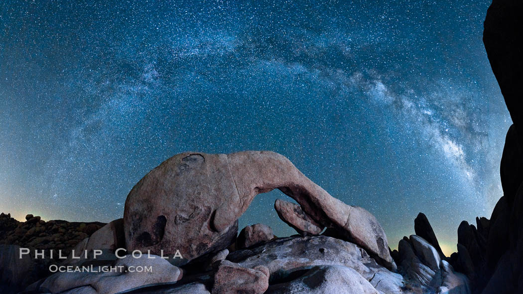 The Milky Way galaxy arcs above Arch Rock, panoramic photograph, spherical projection. Joshua Tree National Park, California, USA, natural history stock photograph, photo id 26851