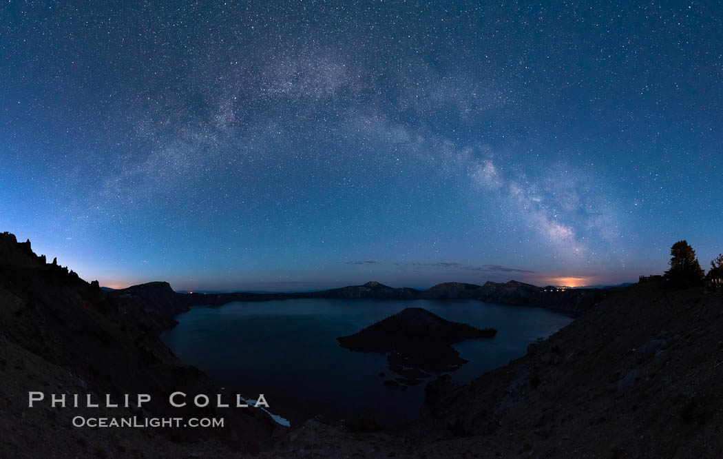 Milky Way and stars over Crater Lake at night. Panorama of Crater Lake and Wizard Island at night, Crater Lake National Park. Oregon, USA, natural history stock photograph, photo id 28636