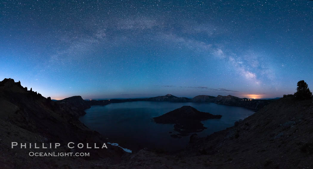 Milky Way and stars over Crater Lake at night. Panorama of Crater Lake and Wizard Island at night, Crater Lake National Park. Oregon, USA, natural history stock photograph, photo id 28635