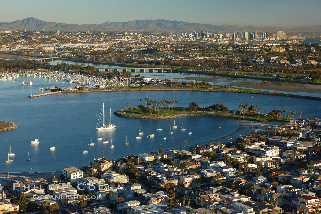 Mission Bay is the largest man-made aquatic park in the country.  It spans 4,235 acres and is split nearly evenly between land and water.  It is situated between the communities of Pacific Beach, Mission Beach, Bay Park and bordered on the south by the San Diego River channel.  Once named "False Bay" by Juan Cabrillo in 1542, the tidelands were dredged in the 1940's creating the basins and islands of what is now Mission Bay. California, USA, natural history stock photograph, photo id 22324