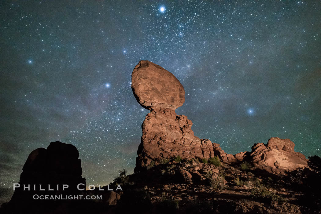 Moon and Stars over Balanced Rock, Arches National Park (Note: this image was created before a ban on light-painting in Arches National Park was put into effect.  Light-painting is no longer permitted in Arches National Park). Utah, USA, natural history stock photograph, photo id 29236