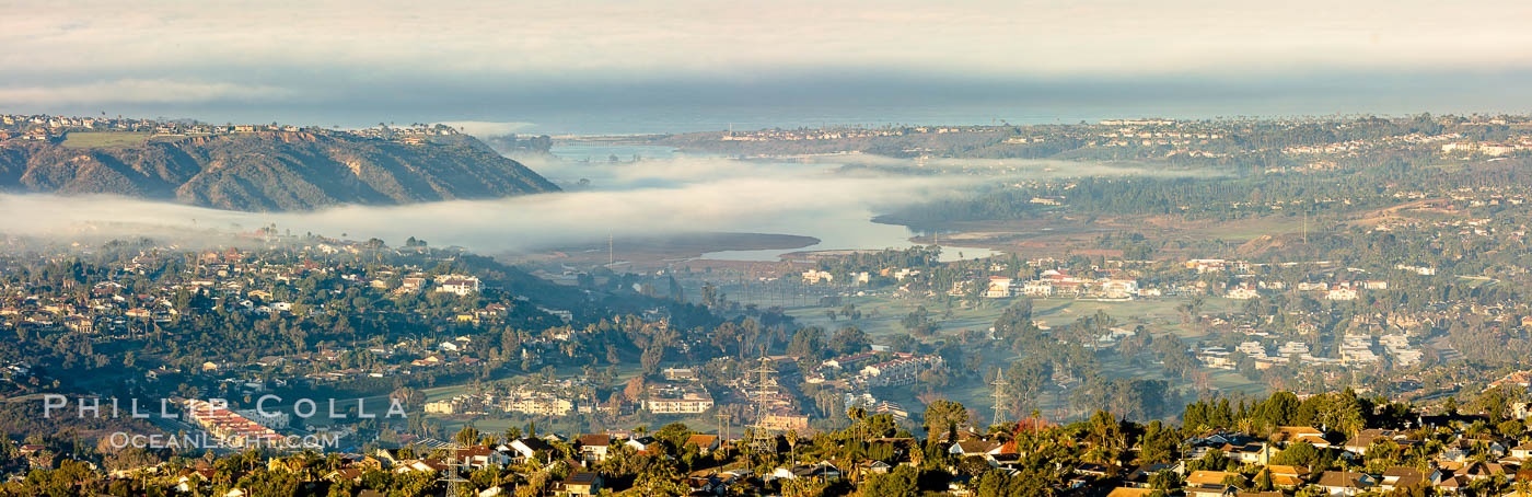 Morning fog over Batiquitos Lagoon, Carlsbad.  The Batiquitos Lagoon is a coastal wetland in southern Carlsbad, California. Part of the lagoon is designated as the Batiquitos Lagoon State Marine Conservation Area, run by the California Department of Fish and Game as a nature reserve. USA, natural history stock photograph, photo id 35852