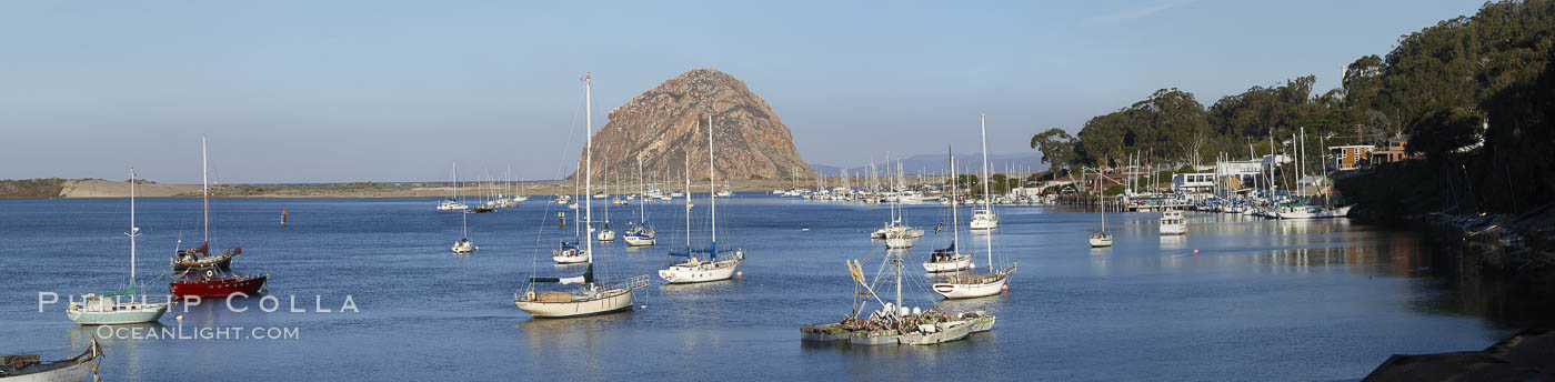 Morro Bay, boats and Morro Rock in the distance. California, USA, natural history stock photograph, photo id 22246