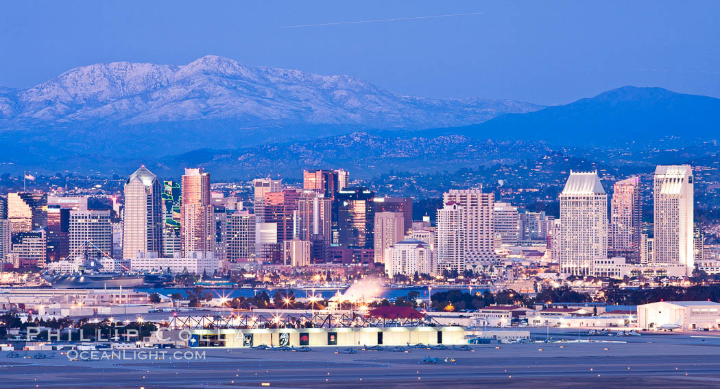 Dusk settles on downtown San Diego with snow-covered Mount Laguna in the distance. California, USA, natural history stock photograph, photo id 26716