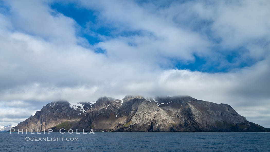 Mountains, ocean and clouds.  The rugged and beautiful topography of South Georgia Island., natural history stock photograph, photo id 24608