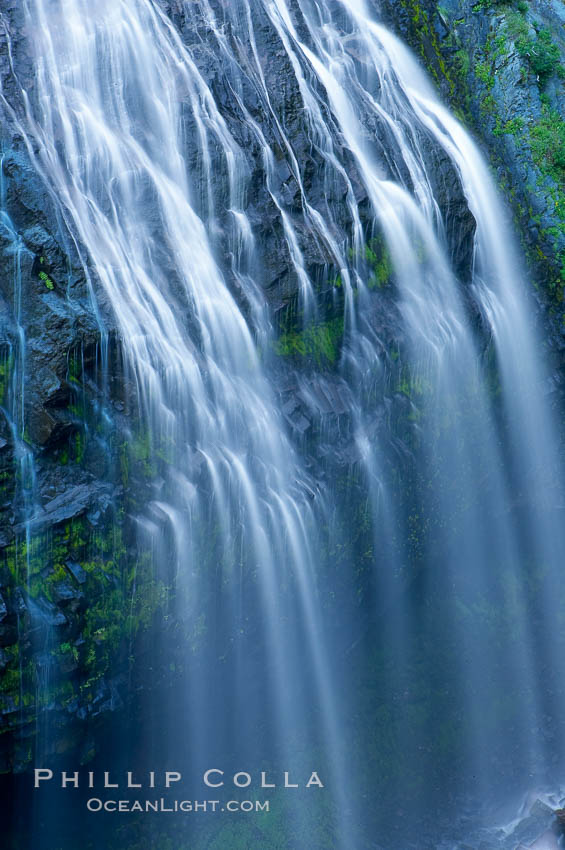 Narada Falls cascades down a cliff, with the flow blurred by a time exposure.  Narada Falls is a 188 foot (57m) waterfall in Mount Rainier National Park. Washington, USA, natural history stock photograph, photo id 13843