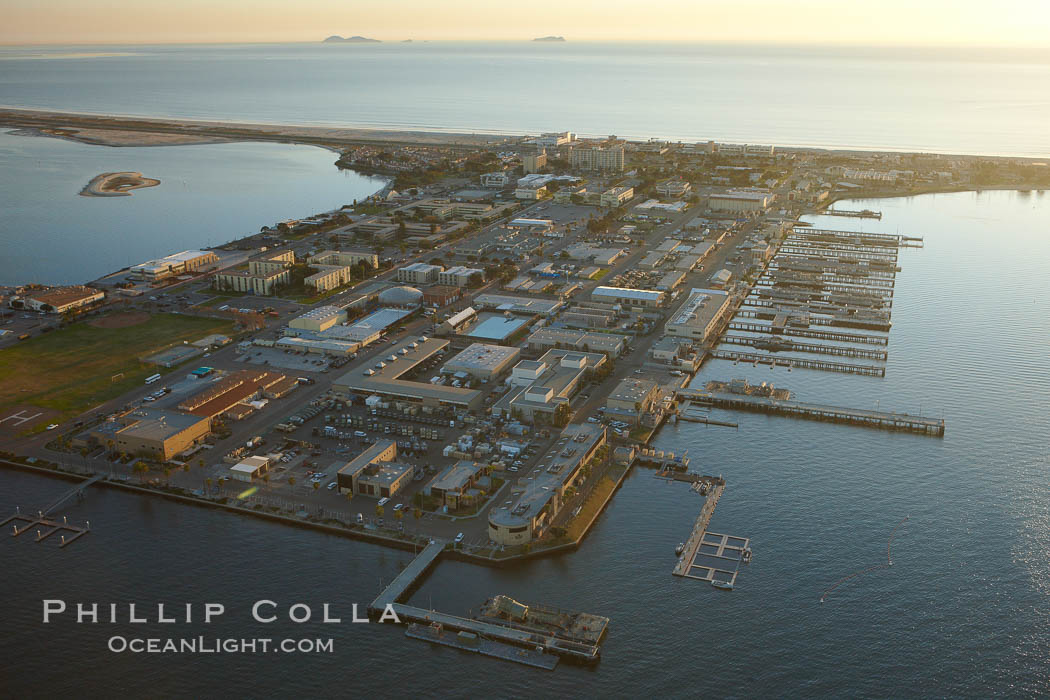 Naval Amphibious Base Coronado, situated on the Silver Strand between San Diego Bay and the Pacific Ocean, is the West Coast focal point for special and expeditionary warfare training and operations.  The famous "swastika building" is seen on the southern (left) side of the base. California, USA, natural history stock photograph, photo id 22298