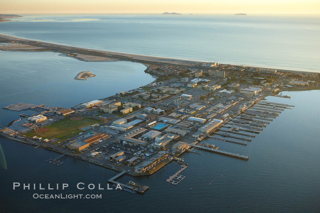 Naval Amphibious Base Coronado, situated on the Silver Strand between San Diego Bay and the Pacific Ocean, is the West Coast focal point for special and expeditionary warfare training and operations.  The famous "swastika building" is seen on the southern (left) side of the base. California, USA, natural history stock photograph, photo id 22329