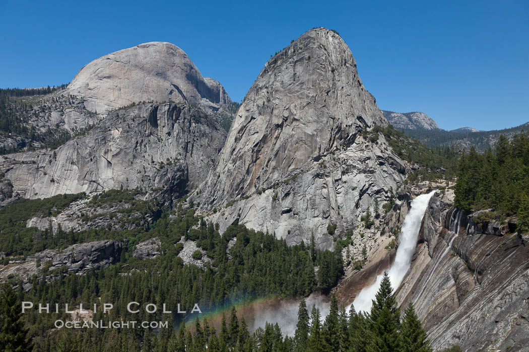 Half Dome and Nevada Falls, with Liberty Cap between them, viewed from the John Muir Trail / Panorama Trail.  Nevada Falls is in peak spring flow from heavy snowmelt in the high country above Yosemite Valley. Yosemite National Park, California, USA, natural history stock photograph, photo id 26875