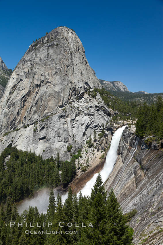 Liberty Cap and Nevada Falls,viewed from the John Muir Trail.  Merced River is in peak spring flow from heavy snow melt in the high country above Yosemite Valley. Yosemite National Park, California, USA, natural history stock photograph, photo id 26873