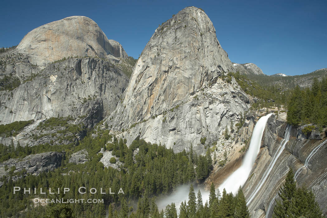 Nevada Falls, with Liberty Cap (center) and Half Dome (left). Nevada Falls marks where the Merced River plummets almost 600 through a joint in the Little Yosemite Valley, shooting out from a sheer granite cliff and then down to a boulder pile far below. Yosemite National Park, California, USA, natural history stock photograph, photo id 16130