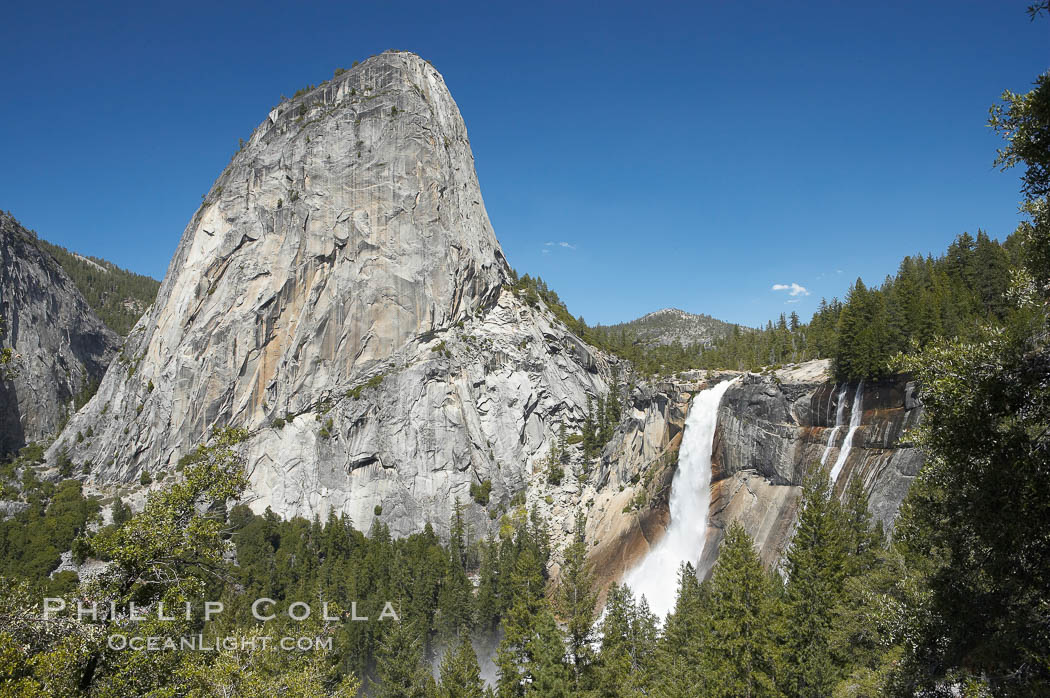 Nevada Falls, with Liberty Cap rising above it. Nevada Falls marks where the Merced River plummets almost 600 through a joint in the Little Yosemite Valley, shooting out from a sheer granite cliff and then down to a boulder pile far below. Yosemite National Park, California, USA, natural history stock photograph, photo id 16127