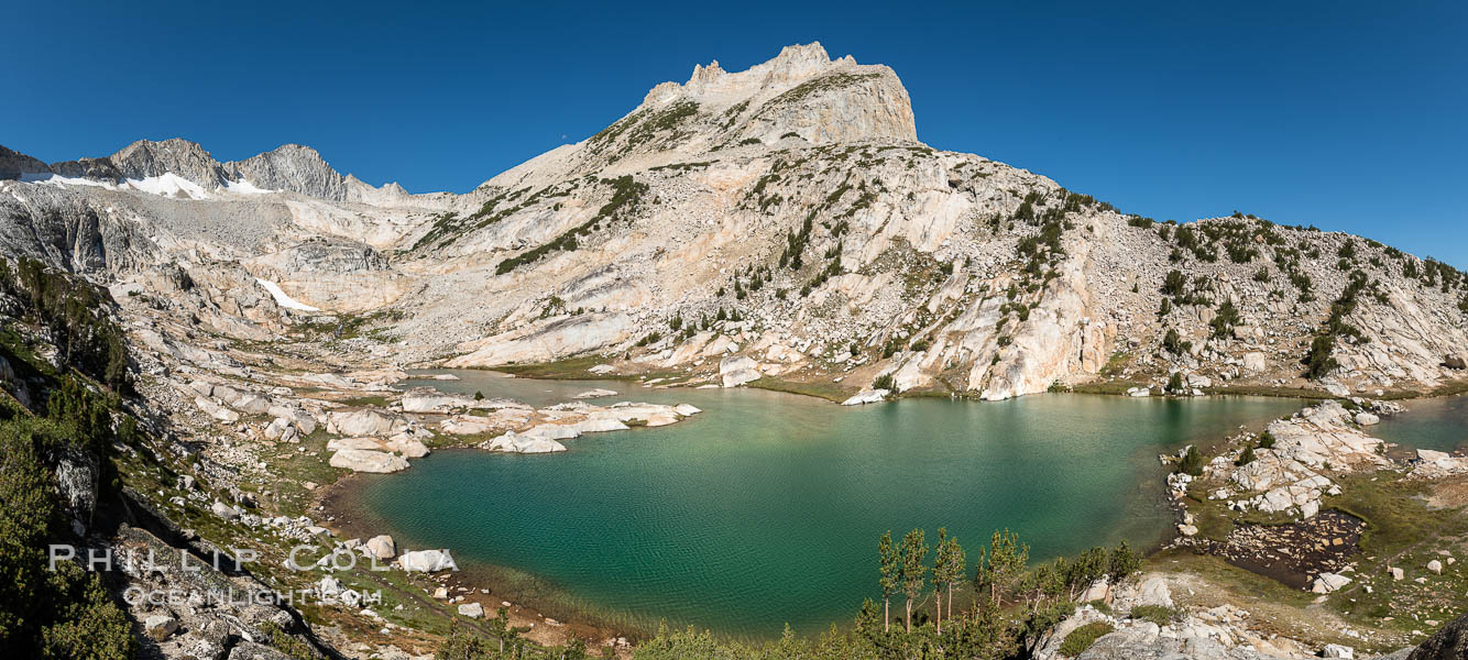 North Peak (12,242') rises over lower Conness Lake, its water colored deep blue-green by glacier runoff.  Mount Conness (12,589') towers in the upper left.  Hoover Wilderness, Inyo National Forest, Conness Lakes Basin