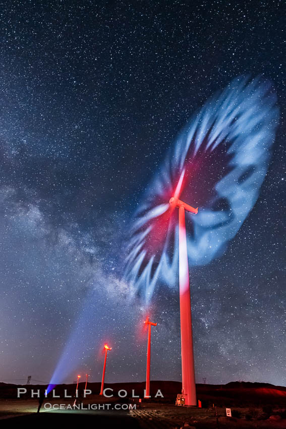 Ocotillo Wind Energy Turbines, at night with stars and the Milky Way in the sky above, the moving turbine blades illuminated by a small flashlight. California, USA, natural history stock photograph, photo id 30240