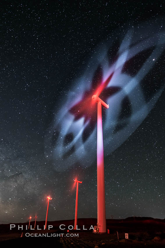 Ocotillo Wind Energy Turbines, at night with stars and the Milky Way in the sky above, the moving turbine blades illuminated by a small flashlight. California, USA, natural history stock photograph, photo id 30233