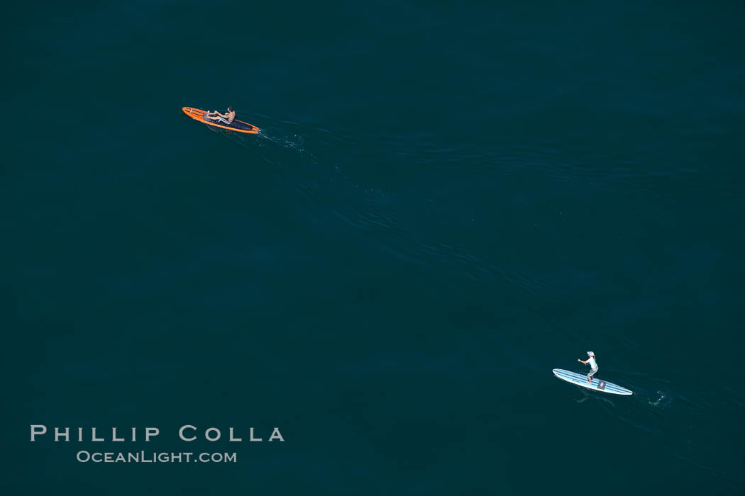 Paddleboarders on the ocean, sweepers standup paddling., natural history stock photograph, photo id 26040
