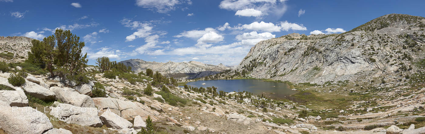 Panorama of Vogelsang basin, surrounding Vogelsang Lake in Yosemite's High Sierra, viewed from near Vogelsang Pass.  Left is Vogelsang Peak (11516'), Choo-choo Ridge is in the distant middle, and the western flank of Fletcher Peak is to the right. Yosemite National Park, California, USA, natural history stock photograph, photo id 23231