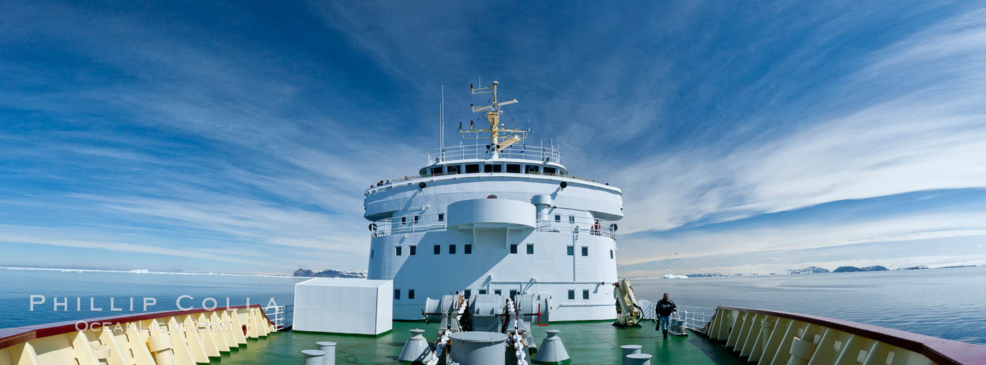 Panoramic of foredeck of M/V Polar Star, cruising through Antarctica under blue skies. Antarctic Peninsula, natural history stock photograph, photo id 26310