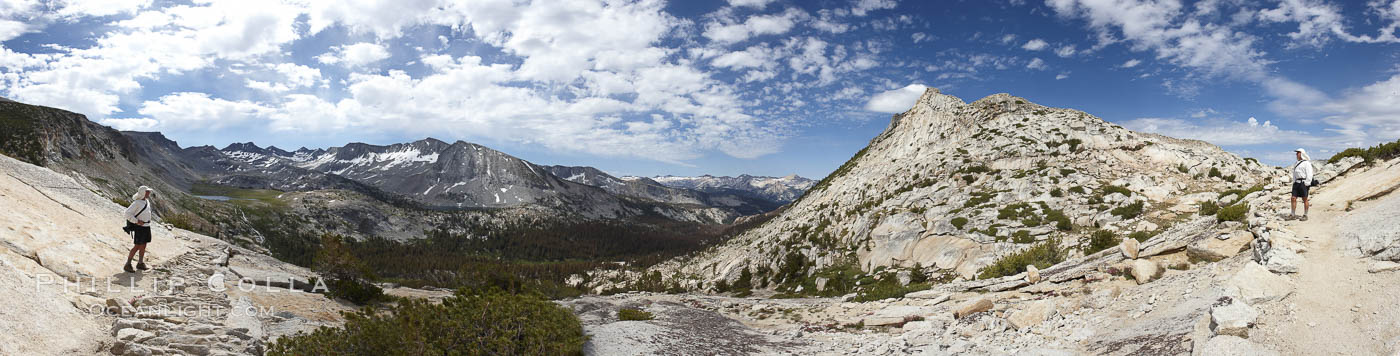 Panoramic view from Vogelsang Pass (10685')  in Yosemite's high country, looking south. A hiker appears twice in this curious panoramic photo, enjoying the spectacular view.  Visible on the left are Parson's Peak (12147'), Gallison Lake and Bernice Lake, while Vogelsang Peak (11516') rises to the right. Yosemite National Park, California, USA, natural history stock photograph, photo id 23210