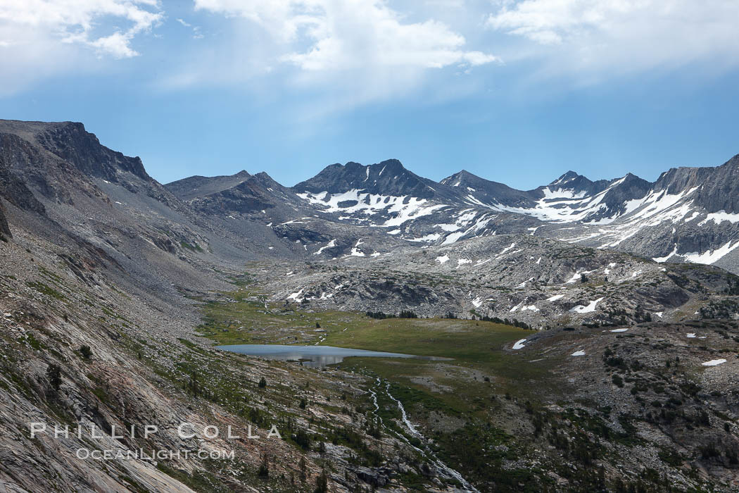 Parson's Peak and Gallison Lake, part of the Cathedral Range of glacier-sculpted granite mountains, viewed from Vogelsang Pass in Yosemite's High Sierra. Yosemite National Park, California, USA, natural history stock photograph, photo id 23244
