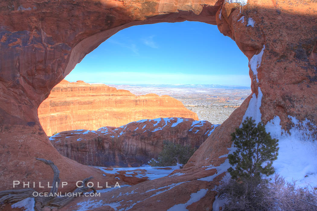 Partition Arch with views of Devils Garden beyond, winter. Arches National Park, Utah, USA, natural history stock photograph, photo id 18174