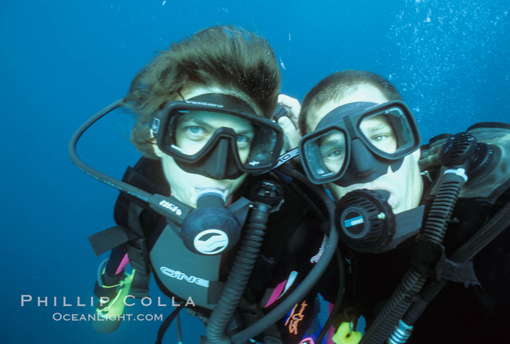 Phillip Colla and Tracy Colla, diving at Wolf Island in the Galapagos. Galapagos Islands, Ecuador, natural history stock photograph, photo id 03469