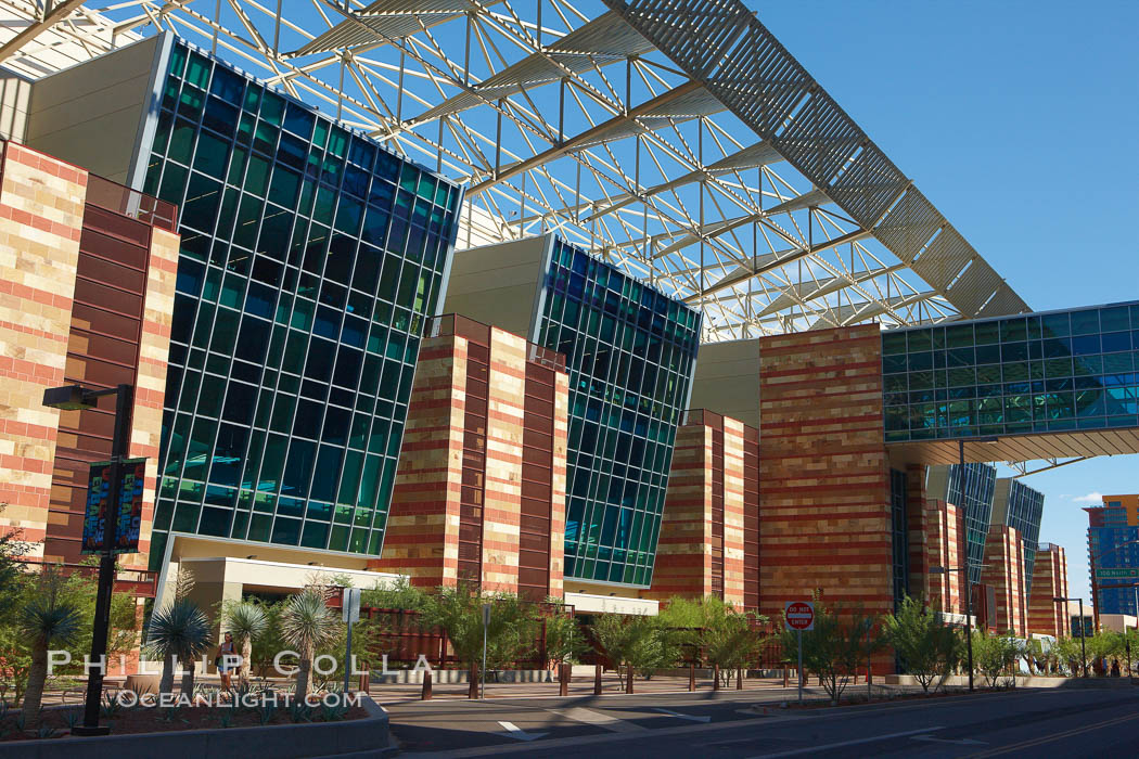 Phoenix Convention Center. Originally built in 1972 and expanded in 1985 and the mid-90's, the Phoenix Convention center offers 300,000 square feet of space for conventions year round.  It's exterior is a mix of modern glass, metal and stone architecture. Arizona, USA, natural history stock photograph, photo id 23184