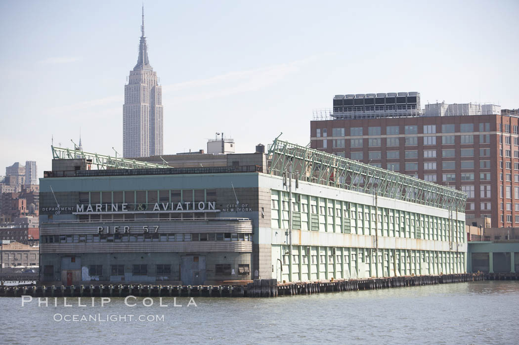 Pier 57.  Manhattan waterline.  Pier 57 is a long pier built on floating concrete caissons in the Hudson River in Manhattan, New York City. Built in 1952, it is located near the end of 15th Street on the West Side Highway, just south of the Chelsea Piers sports complex. USA, natural history stock photograph, photo id 11103