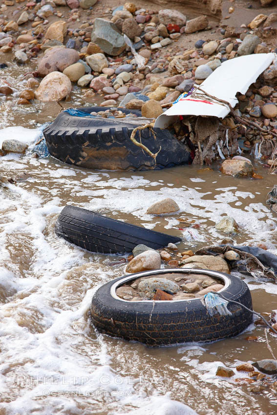 Pollution accumulates in the Tijuana River Valley following winter storms which flush the trash from Tijuana in Mexico across the border into the United States. Imperial Beach, San Diego, California, USA, natural history stock photograph, photo id 22550