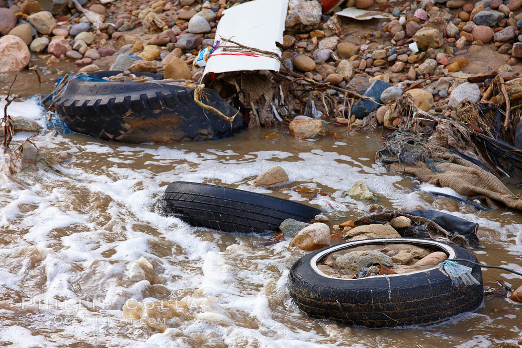 Pollution accumulates in the Tijuana River Valley following winter storms which flush the trash from Tijuana in Mexico across the border into the United States. Imperial Beach, San Diego, California, USA, natural history stock photograph, photo id 22549