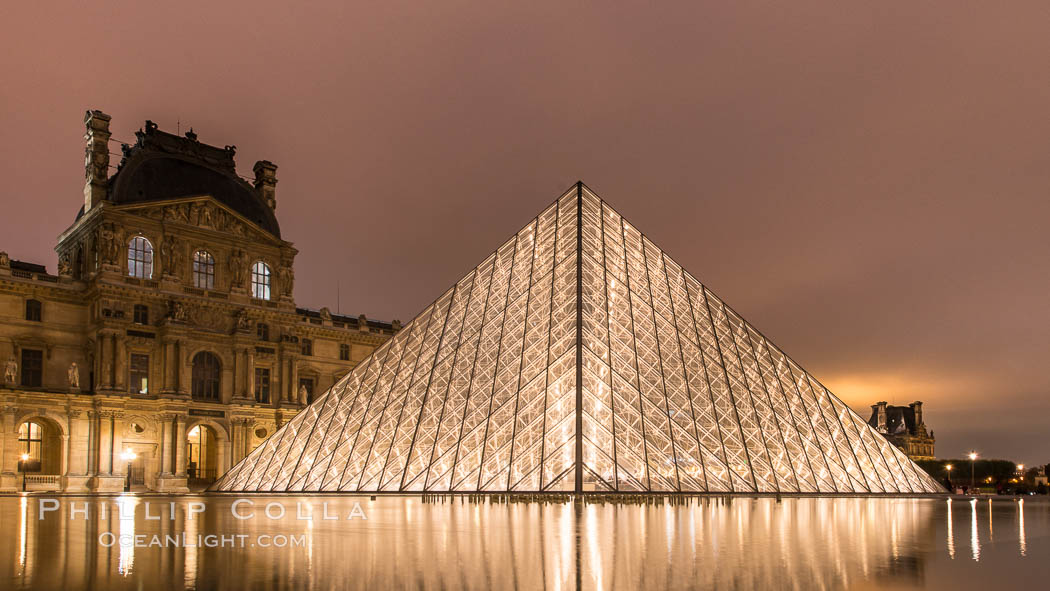 The Louvre Pyramid, Pyramide du Louvre,  large glass and metal pyramid in the main courtyard (Cour Napoleon) of the Louvre Palace (Palais du Louvre) in Paris. Musee du Louvre, France, natural history stock photograph, photo id 28093