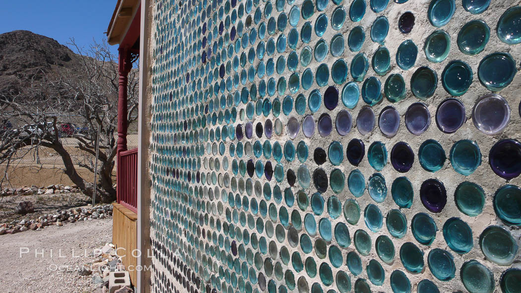 The strange "bottle house" of Rhyolite ghost town, near Death Valley. It was built in 1906 by Tom Kelley of approximately 50,000 beer bottles and was his home for a while. Nevada, USA, natural history stock photograph, photo id 20589