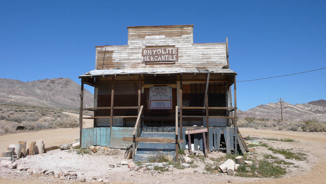 Former mercantile store building, long abandoned, in the ghost town of Rhyolite.  Rhyolite, on the border of Death Valley, was a gold and mineral mining town from 1904 to 1919, when it was abandoned. Nevada, USA, natural history stock photograph, photo id 20555