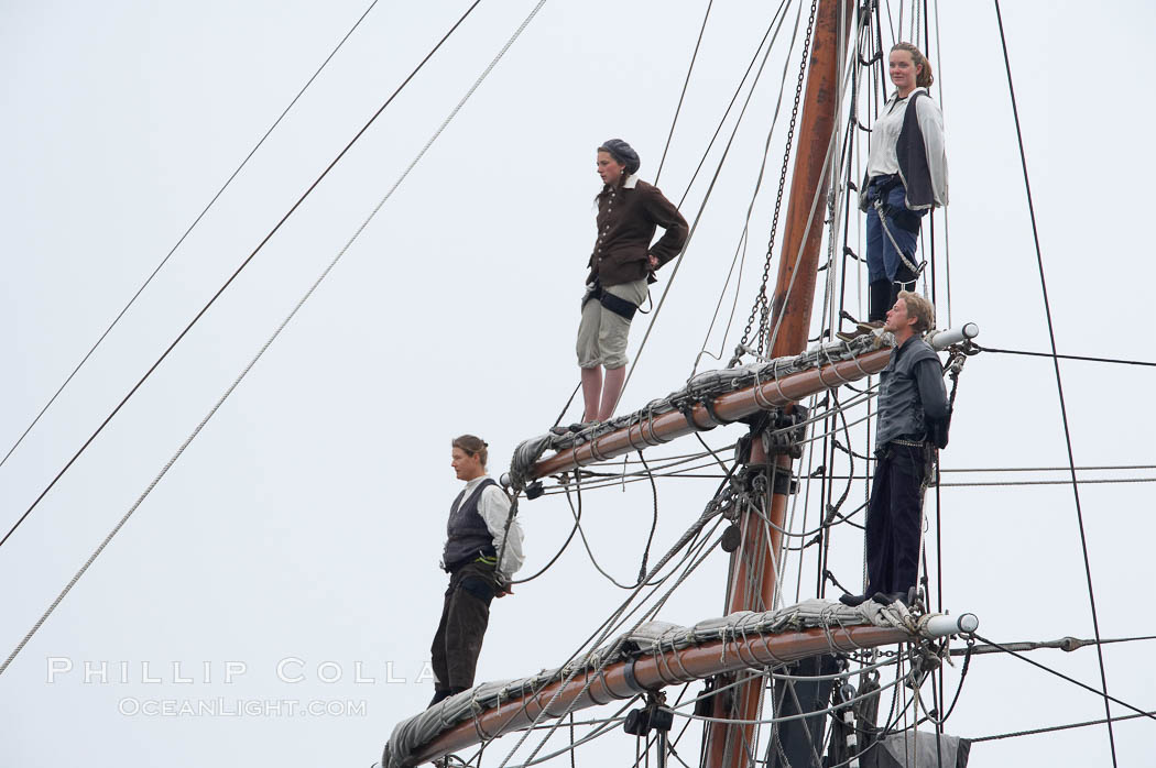 Crew members stand in the rigging of the tall ship Hawaiian Chieftain. Morro Bay, California, USA, natural history stock photograph, photo id 20347