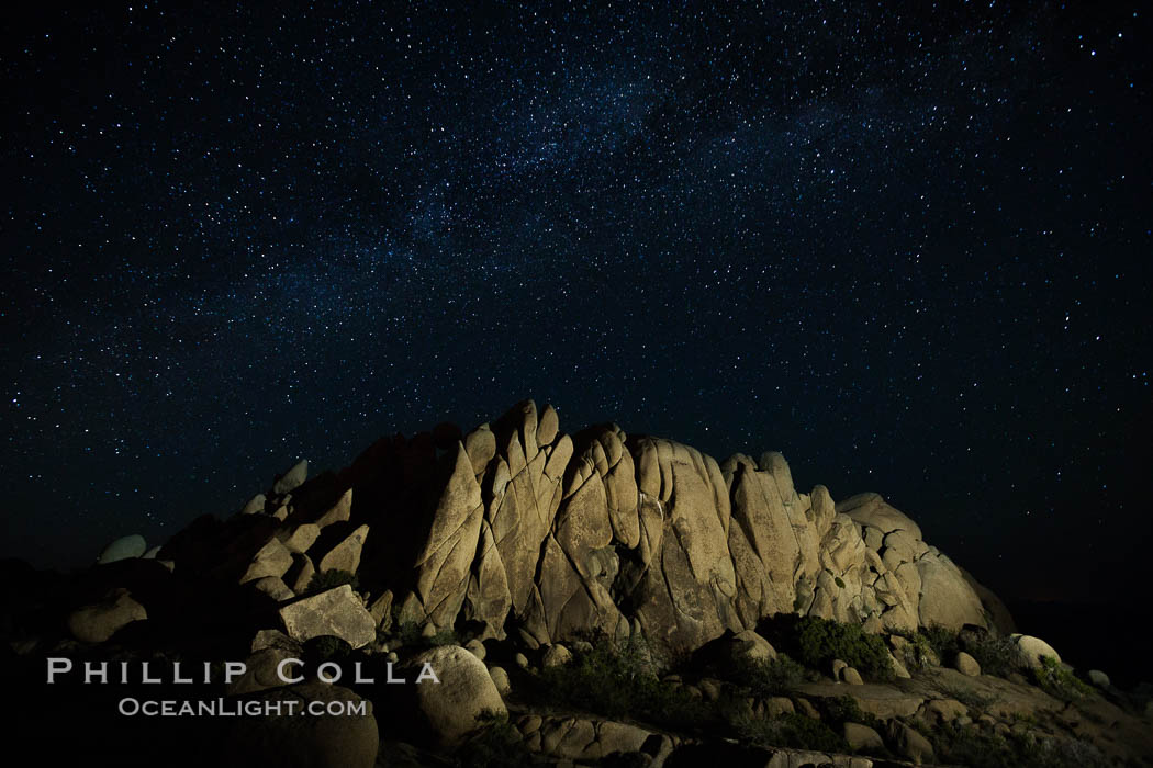 Rocks and Milky Way arching overhead, night sky and stars above. Joshua Tree National Park, California, USA, natural history stock photograph, photo id 27897