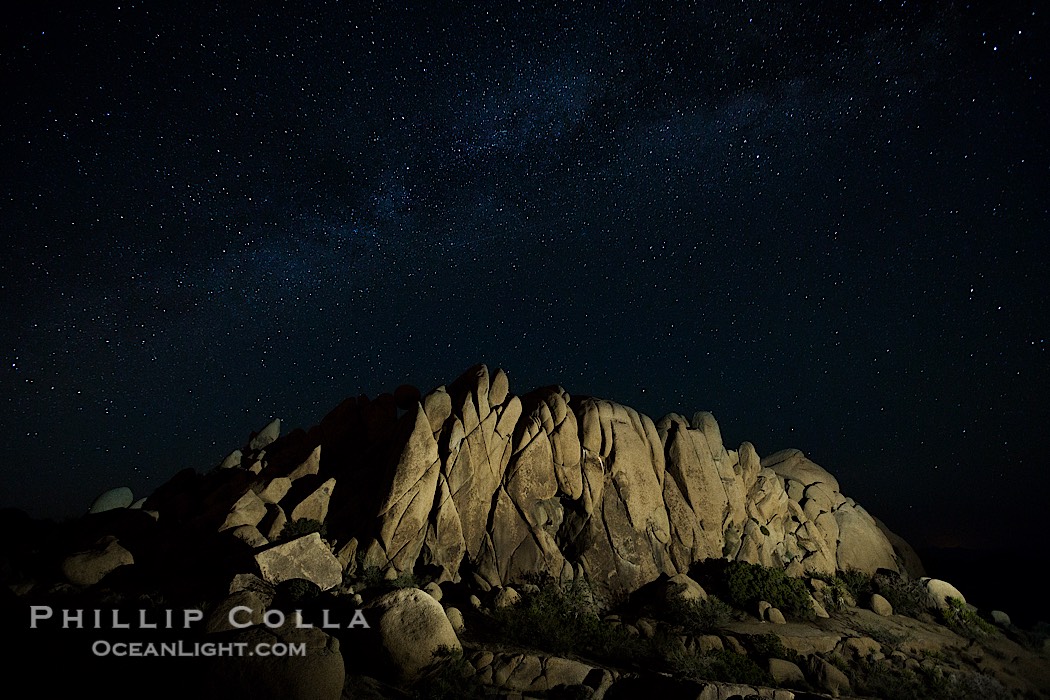 Rocks and Milky Way arching overhead, night sky and stars above., natural history stock photograph, photo id 27897