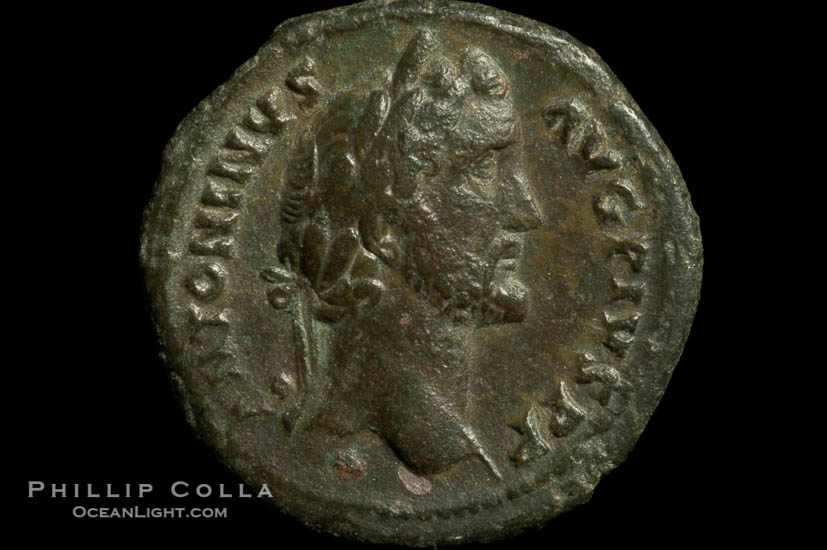 Roman emperor Antonius Pius (138-161 A.D.), depicted on ancient Roman coin (bronze, denom/type: As) (As. Obverse: ANTONIUS AVG PIUS PP. Reverse: TR POT COS II SC PAX (exergue). PAX stg left., holding branch and cornucopiae.)., natural history stock photograph, photo id 06556