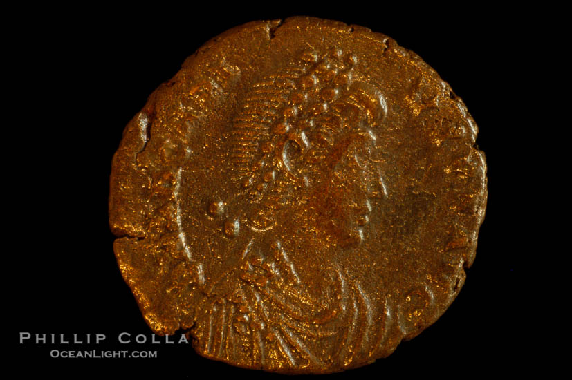 Roman emperor Arcadius (383-408 A.D.), depicted on ancient Roman coin (bronze, denom/type: AE3) (AE 16mm; Sear 4233. Obverse: DN ARCADIVS PF AVG. Reverse: VIRTVS EXERCITI, CONSB exergue.)., natural history stock photograph, photo id 06734