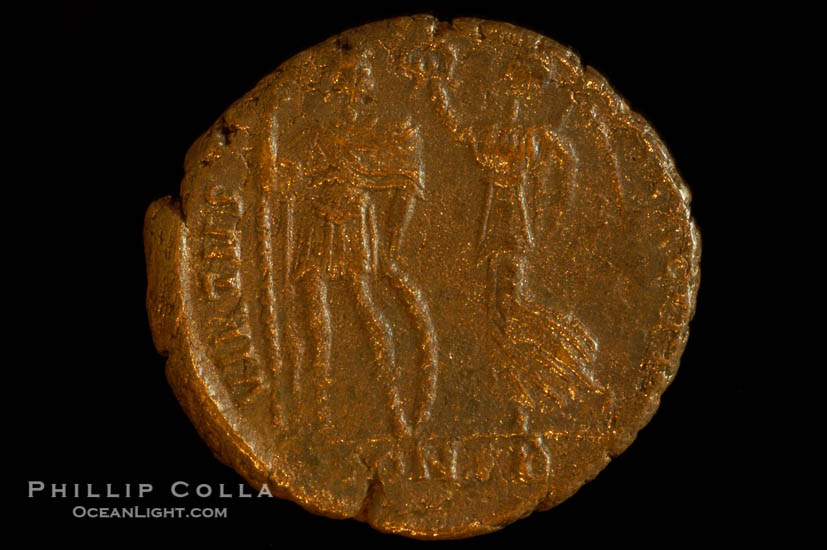 Roman emperor Arcadius (383-408 A.D.), depicted on ancient Roman coin (bronze, denom/type: AE3) (AE 16mm; Sear 4233. Obverse: DN ARCADIVS PF AVG. Reverse: VIRTVS EXERCITI, CONSB exergue.)., natural history stock photograph, photo id 06736