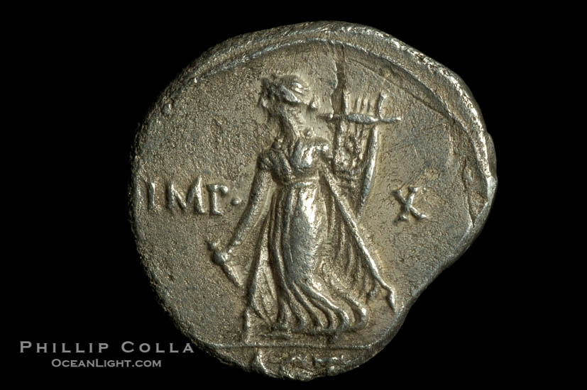 Roman emperor Augustus (27 B.C.-14 A.D.), depicted on ancient Roman coin (silver, denom/type: Denarius) (Denarius, Actian Apollo; Battle of Actium. Sear 1611.)., natural history stock photograph, photo id 06777